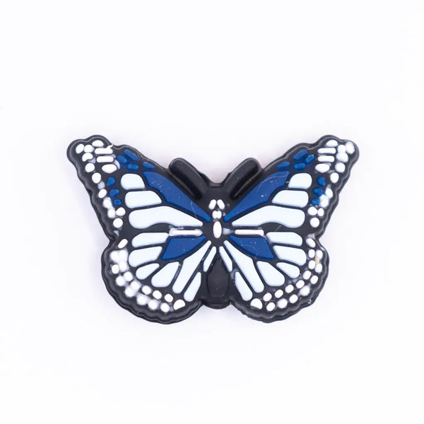 top view of a pile of Blue Butterfly Silicone Focal Bead Accessory