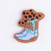 top view of a pile of Blue Cowgirl Boot Silicone Focal Bead Accessory