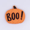 top view of a pile of Boo Pumpkin Silicone Focal Bead Accessory