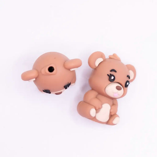 top view of a pile of Brown Bear 3D Silicone Focal Bead Accessory