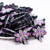 front view of a pile of Butterfly Cross Silicone Focal Bead Accessory