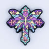 top view of a pile of Butterfly Cross Silicone Focal Bead Accessory