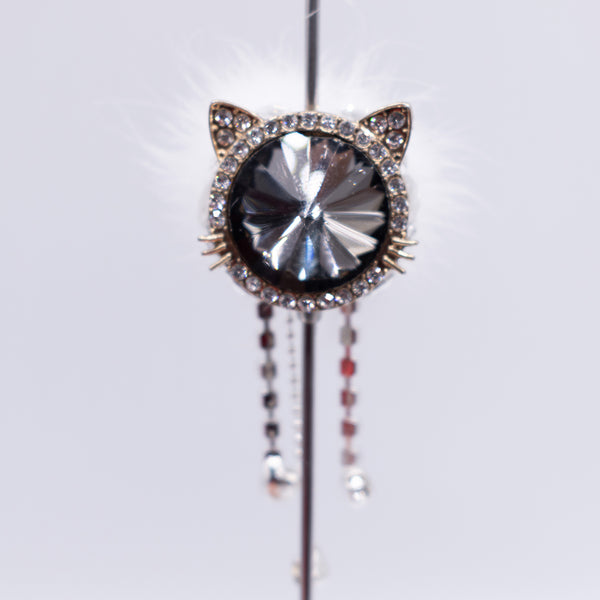 front view of a pile of 26mm Black Cat with fur and rhinestone surround acrylic bead