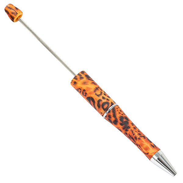 top view of a orange leopard  print DIY Plastic Beadable Pens - The Printed Collection
