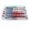 front view of a pile of Christmas Print Mixed Beadable Pen Kit - case included - 10 pieces