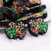 close up view of a pile of Clover Hearts Silicone Focal Bead Accessory