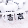 Zoomed view of a pile of Coffee - Teach - Repeat Coffee Cup Silicone Focal Bead Accessory