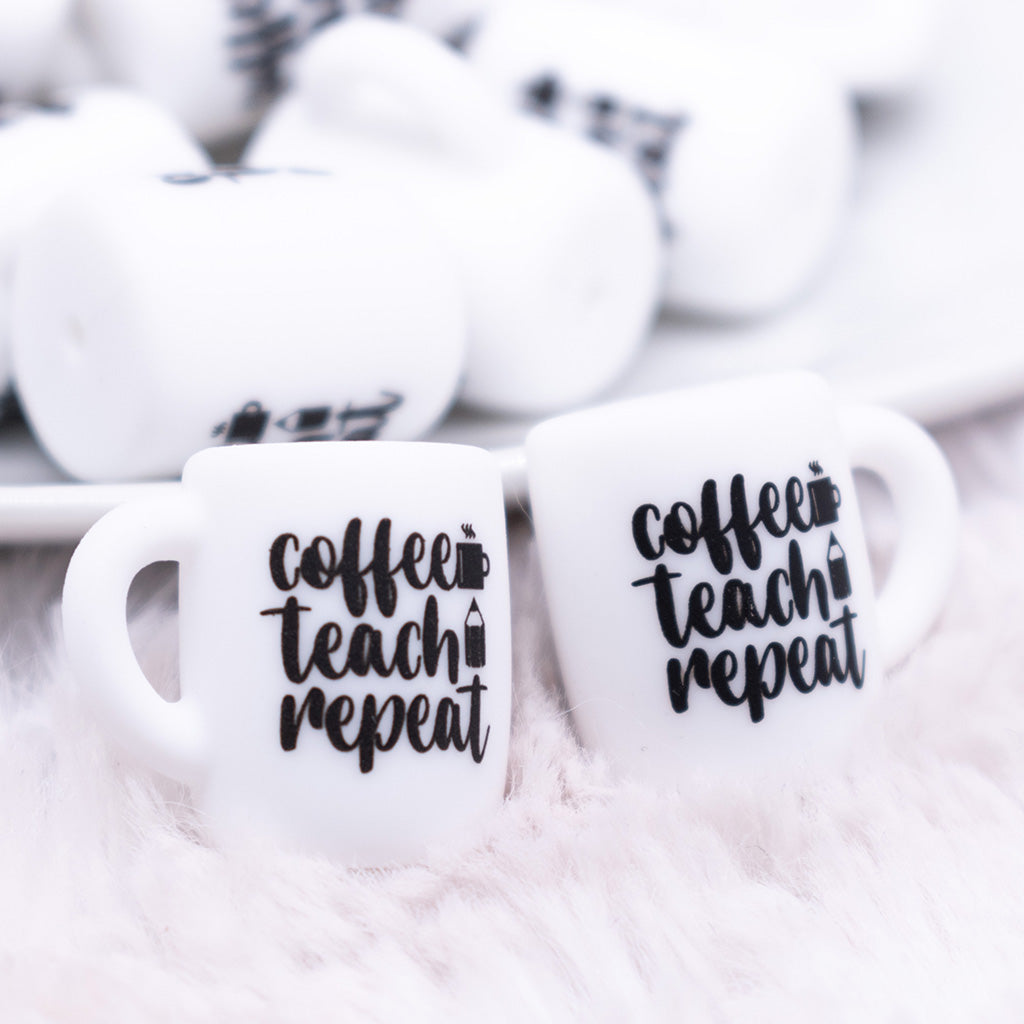 https://thebumblebeadcompany.com/cdn/shop/files/CoffeeTeachRepeatsiliconefocalcoffeecupcloseup_1024x.jpg?v=1683060745