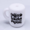 macro view of a pile of Coffee - Teach - Repeat Coffee Cup Silicone Focal Bead Accessory