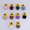 top view of a pile of Sunflower Pot Silicone Focal Beads Accessory