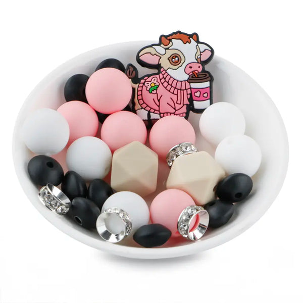 front view of a pile of Cow Silicone Variety Bead Pack- 27 Pieces