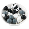 front view of a pile of Cow Silicone Variety Bead Pack- 27 Pieces