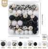 detailed view of a pile of Cream Leopard Print Silicone Variety Bead Pack - 64 Pieces