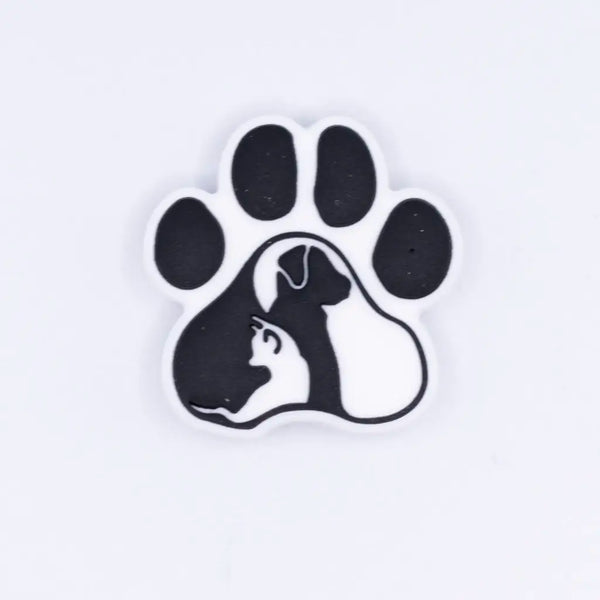 top view of a pile of Dog and Cat Paw Print Silicone Focal Bead Accessory