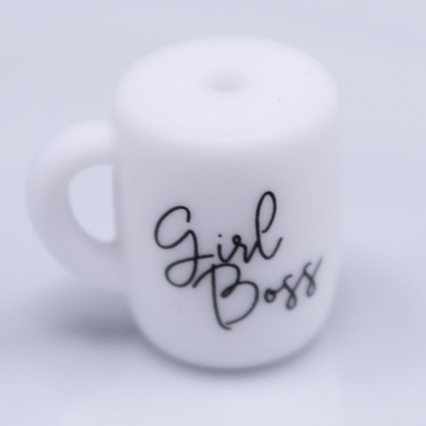 macro view of a pile of Girl Boss Coffee Cup Silicone Focal Bead Accessory