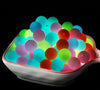view of a pile of 15mm glow in the dark silicone beads