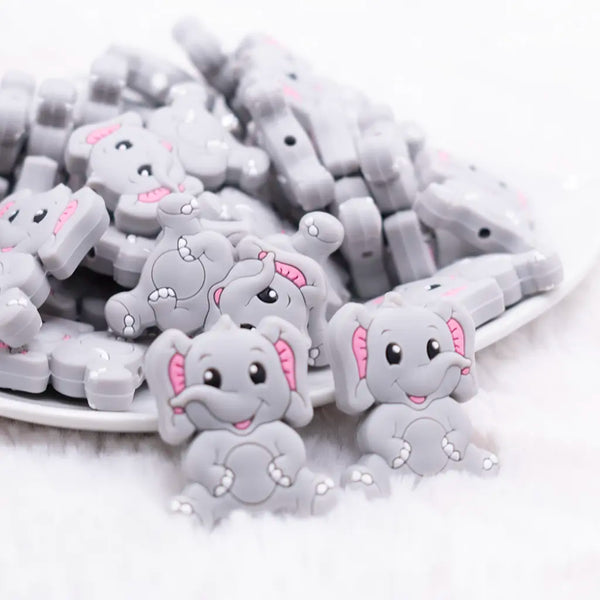 front view of a pile of Gray Elephant Silicone Focal Bead Accessory