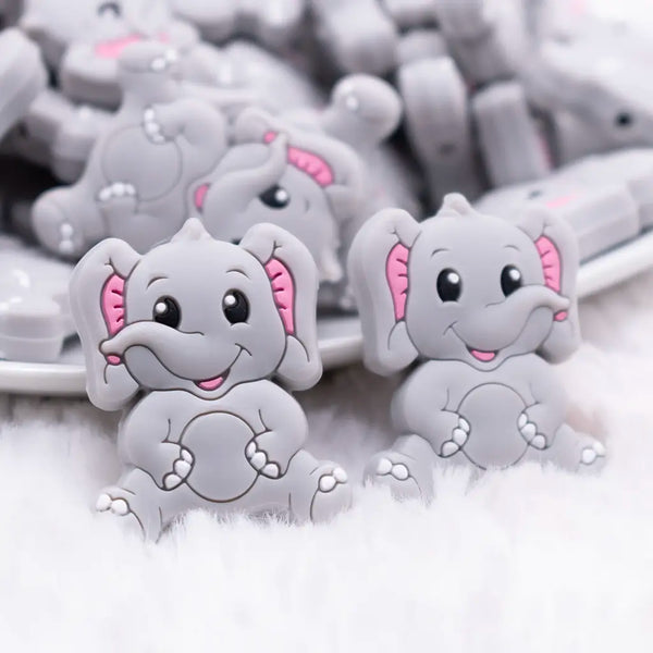 close up view of a pile of Gray Elephant Silicone Focal Bead Accessory