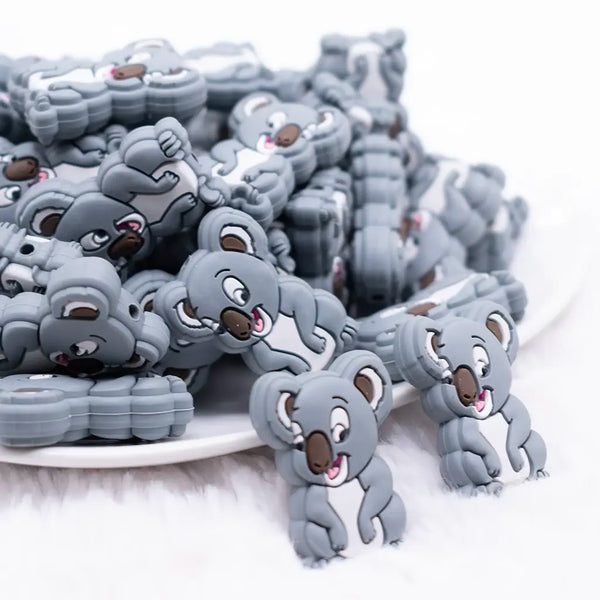 front view of a pile of Gray Koala Silicone Focal Bead Accessory