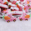 close up view of a pile of Happy Easter Truck Silicone Focal Bead Accessory