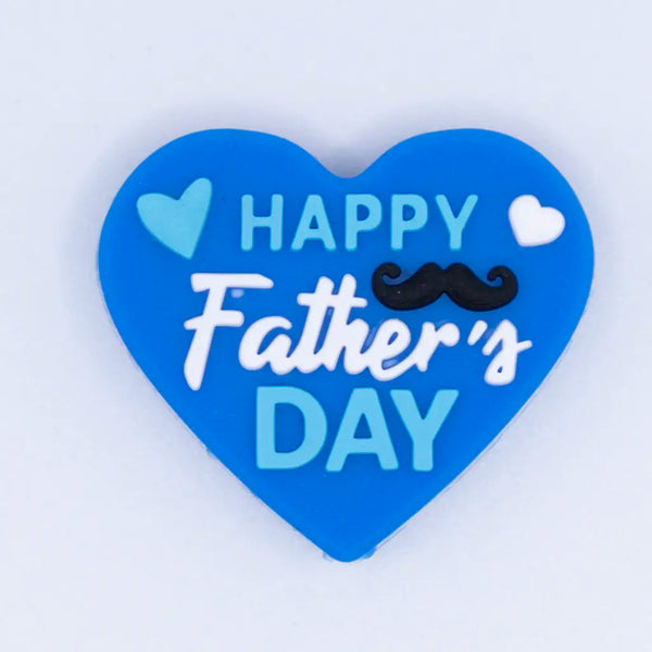 top view of a pile of Father's Day Silicone Focal Bead Accessory