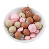 front view of a pile of Highland Cow Silicone Variety Bead Pack- 27 Pieces