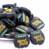 front view of a pile of Hocus Pocus silicone focal bead