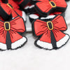 macro view of a pile of Christmas Bow Silicone Focal Bead Accessory