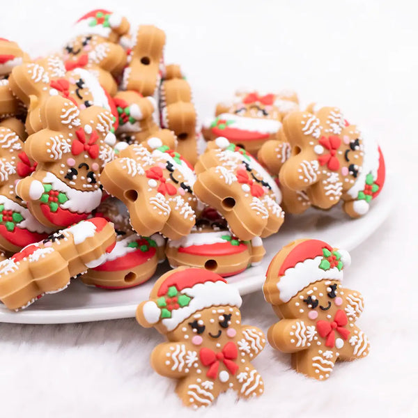 front view of a pile of Gingerbread Man Silicone Focal Bead Accessory