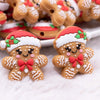 macro view of a pile of Gingerbread Man Silicone Focal Bead Accessory