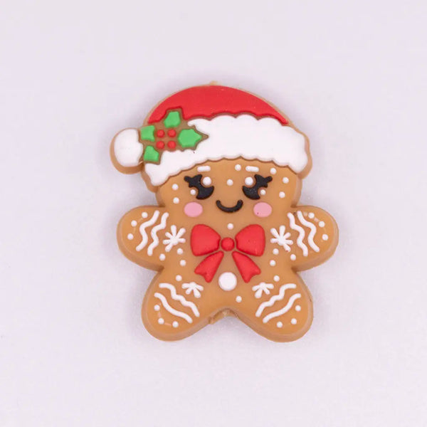 close up view of a pile of Gingerbread Man Silicone Focal Bead Accessory