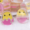 close up view of a pile of 26mm Hot Pink Easter Egg with Chick acrylic bead