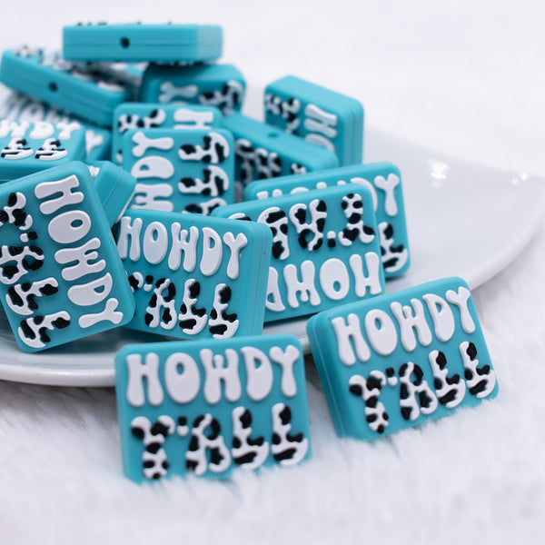 front view of a pile of Howdy Y'All Silicone Focal Bead Accessory