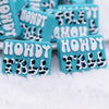 close up view of a pile of Howdy Y'All Silicone Focal Bead Accessory