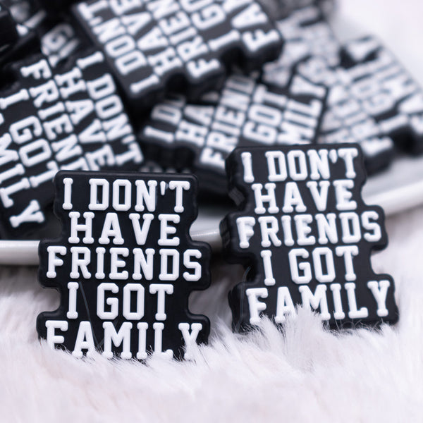 close up view of a pile of I Don't Have Friends, I Have Family Silicone Focal Bead Accessory