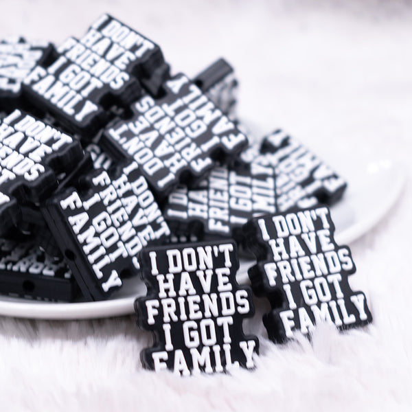 front view of a pile of I Don't Have Friends, I Have Family Silicone Focal Bead Accessory