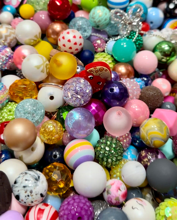 Top view of a pile of Mystery Bumble Bags - Bubblegum Bead Mix - While Supplies Last
