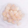 top view of a pile of 25mm Ivory Clover acrylic bead