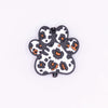 top view of a pile of Leopard Paw Print Silicone Focal Bead Accessory