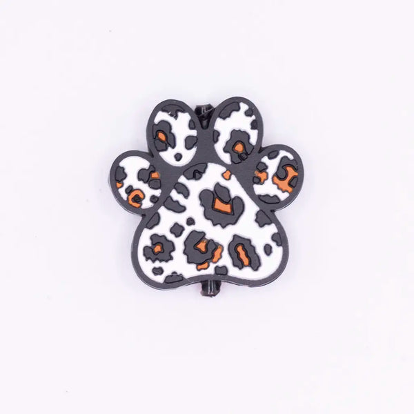 top view of a pile of Leopard Paw Print Silicone Focal Bead Accessory