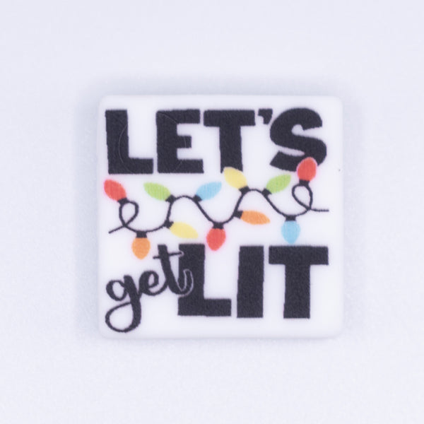 top view of a pile of Let's Get Lit Silicone Focal Bead Accessory