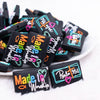 front view of a pile of Made To Worship Silicone Focal Bead Accessory