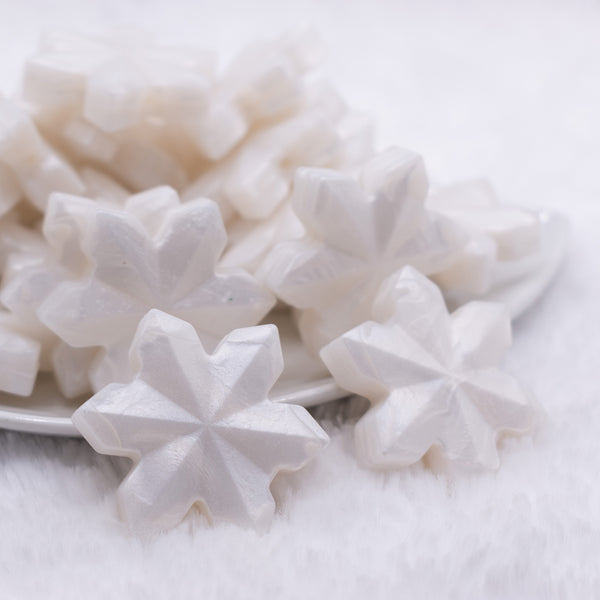 front view of a Metallic White Snowflake Silicone Focal Bead Accessory