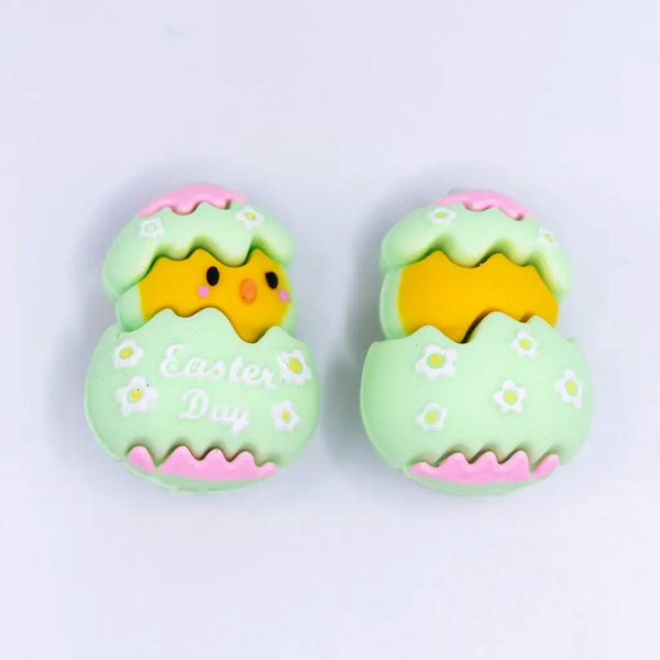 top view of a pile of 3D Green Chick Easter Silicone Focal Bead Accessory