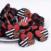 front view of a pile of Triple Hearts Silicone Focal Bead Accessory