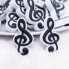 close up view of a pile of Music Note Silicone Focal Bead Accessory