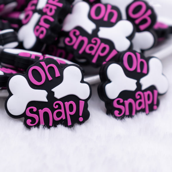 close up view of a pile of Oh Snap Silicone Focal Bead Accessory