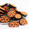 front view of a pile of Orange Pumpkin Silicone Focal Bead Accessory