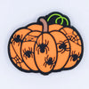 top view of a pile of Orange Pumpkin Silicone Focal Bead Accessory