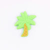 top view of a pile of Palm Tree Silicone Focal Bead Accessory